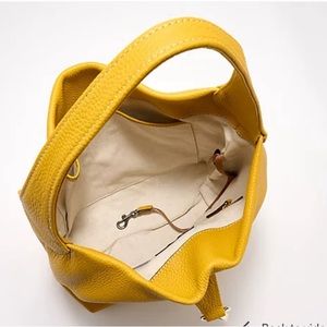 Dooney and Bourke mustard colored hobo bag!